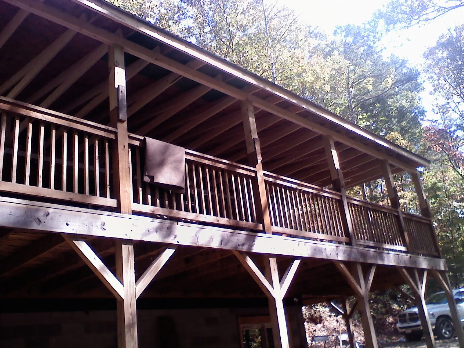 Timber framing under a new elevated porch and deck — Roof Leak Repair in New City by Roofing Brothers